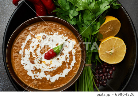 Dal Makhani at dark background Dal Makhani at dark background 69904526