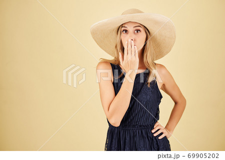 Surprised young woman Surprised young woman 69905202