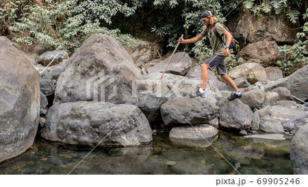 tourist walks on the stone 69905246