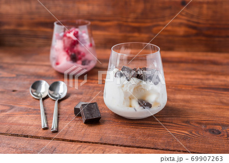 Sweet desert with ice cream, chocolate and berries 69907263