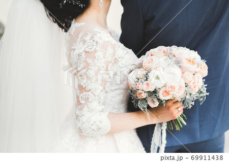 Wonderful luxury wedding bouquet of different flowers 69911438