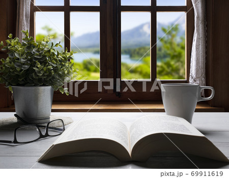 A open book on the table A open book on the table 69911619
