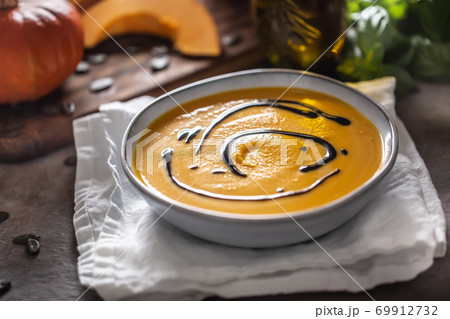 Homemade pumpkin soup in bowles with. Autumn hokkaido soup with balsamic vinegar Homemade pumpkin soup in bowles with. Autumn hokkaido soup with balsamic vinegar 69912732