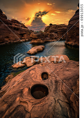 Landscape of sunset at Sam Phan Bok in Ubonratchathani unseen in Thailand. The Grand Canyon of Thailand. Landscape of sunset at Sam Phan Bok in Ubonratchathani unseen in Thailand. The Grand Canyon of Thailand. 69913055