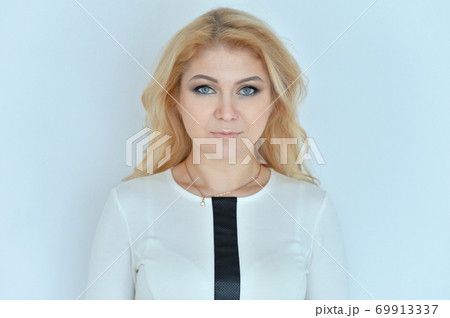 Portrait of a beautiful blonde young woman 69913337
