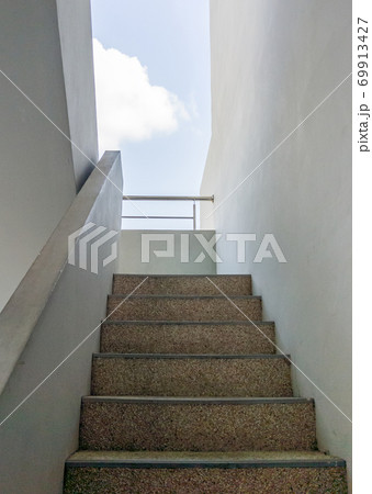 Concrete staircase of the fire escape. Concrete staircase of the fire escape. 69913427