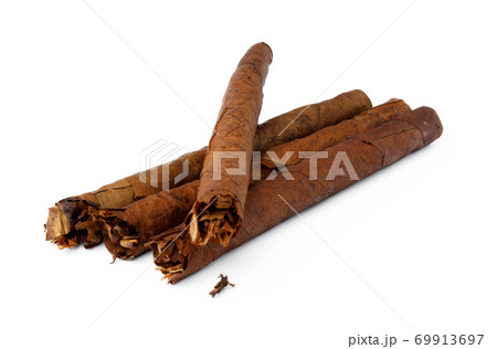 Bunch of hand rolled cigars isolated on white Bunch of hand rolled cigars isolated on white 69913697