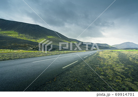 Icelandic landscape with asphalt road Icelandic landscape with asphalt road 69914701