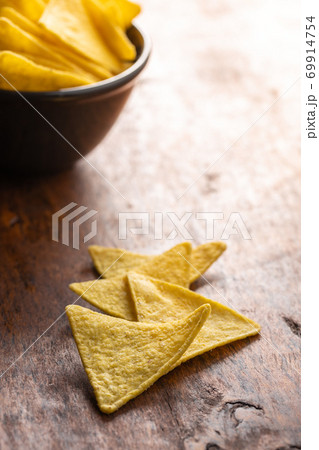 Salted tortilla chips. 69914754