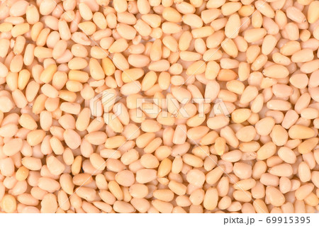 Pine nuts top view. 69915395