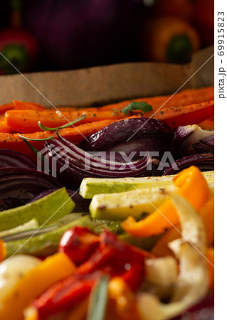 Stewed vegetables on a baking sheet 69915823