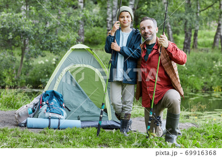 Father and Son Enjoying Outdoor Tourism Father and Son Enjoying Outdoor Tourism 69916368