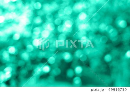 Holiday bright trendy mint lights bokeh background. Holiday bright trendy mint lights bokeh background. 69916759