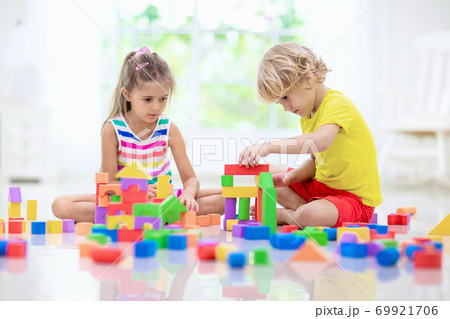 Child playing with toy blocks. Toys for kids. Child playing with toy blocks. Toys for kids. 69921706