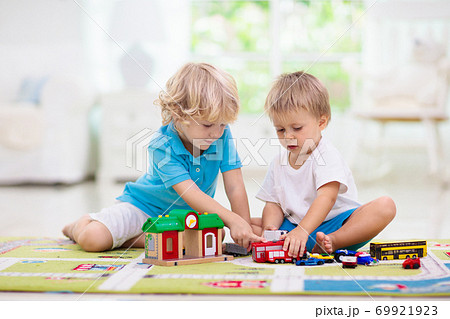 Boy playing toy cars. Kid with toys. Child and car 69921923