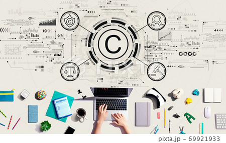 Copyright concept with person using a laptop 69921933