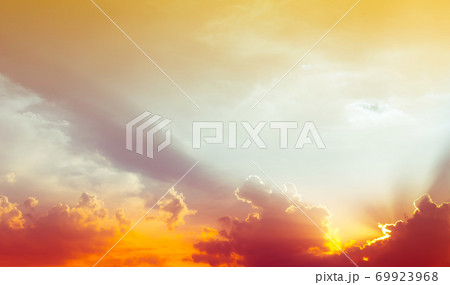 sky and clouds nature background,red light on clouds and bright yellow sun light on colorful sky 69923968