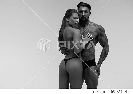 Sexy young couple in studio Sexy young couple in studio 69924442