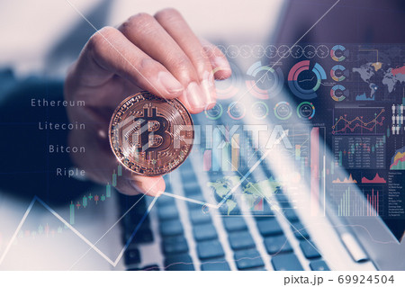 Businesspeople handle Bitcoin money represent modern digital technology of cryptocurrency concept. Businesspeople handle Bitcoin money represent modern digital technology of cryptocurrency concept. 69924504