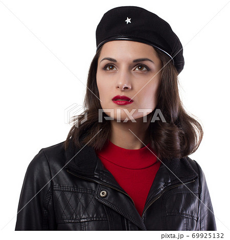 Young woman black jacket, red sweater and hat with a reference to Ernesto Che Guevara on a white background Young woman black jacket, red sweater and hat with a reference to Ernesto Che Guevara on a white background 69925132