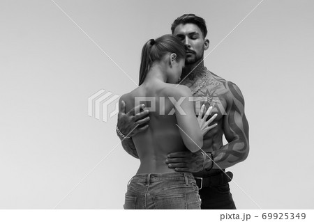 Sexy young couple in studio Sexy young couple in studio 69925349