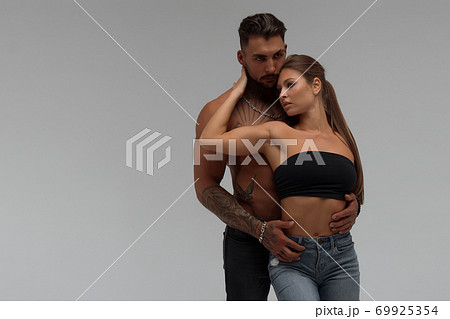 Sexy couple in panties hugging each other Sexy couple in panties hugging each other 69925354