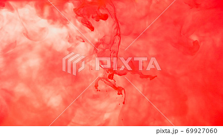 Red ink drop in water on white background. Watercolor paint splash abstract. 69927060