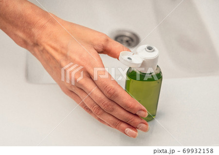 Coronavirus. Proper disinfection of hand treatment with alcohol gel. Self-isolation and hygiene. Coronavirus. Proper disinfection of hand treatment with alcohol gel. Self-isolation and hygiene. 69932158