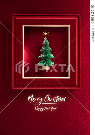 Merry Christmas and happy new year text and Christmas tree in felt photo frame on velvet red felt fabric top view background Merry Christmas and happy new year text and Christmas tree in felt photo frame on velvet red felt fabric top view background 69932440