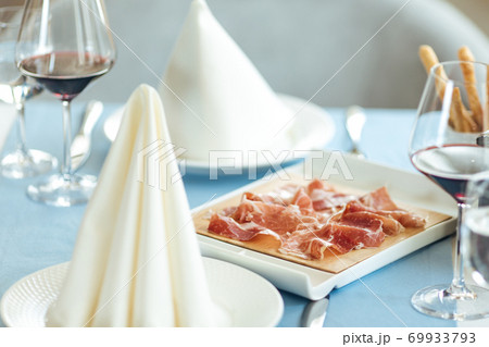 Spanish sliced pork jamon with red wine 69933793