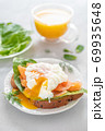 delicious poached egg with salmon fish and orange juice 69935648