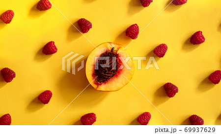 Raspberries and peaches for healthy summer eating 69937629