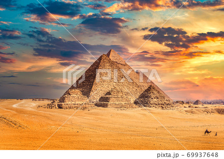Egyptian pyramids at sunset 69937648