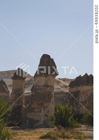 Landscape of the Valley of Love in Cappadocia, Turkey on a clear summer day Landscape of the Valley of Love in Cappadocia, Turkey on a clear summer day 69938202