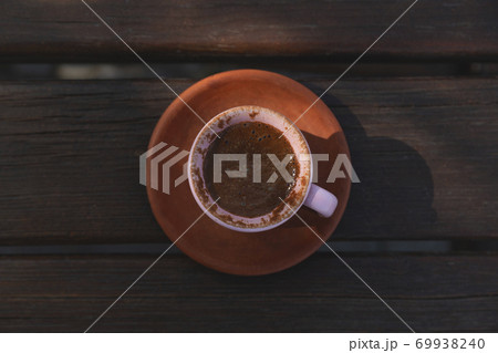 Clay Turka And Cups For Coffee On A Wooden Background Stock Photo