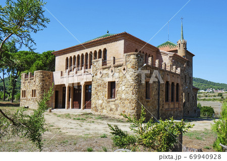 school building in Colonia Guell, Spain 69940928