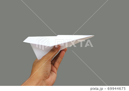 paper plane in a hand paper plane in a hand 69944675