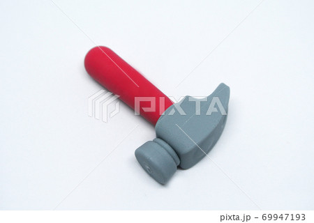 Selective focused, an image of toy hammer made from red and grey soft rubber isolated on white background. Selective focused, an image of toy hammer made from red and grey soft rubber isolated on white background. 69947193