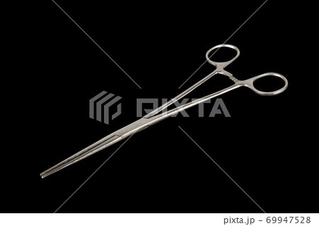 Forceps isolated on a black background 69947528