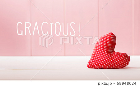 Gracious - Thank you in Spanish language with a red heart cushion Gracious - Thank you in Spanish language with a red heart cushion 69948024