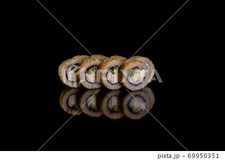 Fresh delicious beautiful sushi rolls on a dark background 69950351