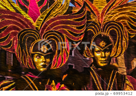 Revelers wearing costumes at the Venice Carnival Revelers wearing costumes at the Venice Carnival 69953412