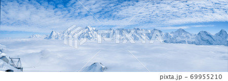 Stunning Panoramic view Snow moutain of the Swiss Skyline from Piz Gloria Schilthorn, Switzerland Stunning Panoramic view Snow moutain of the Swiss Skyline from Piz Gloria Schilthorn, Switzerland 69955210