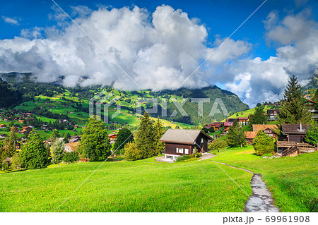Fantastic mountain resort in the Alps, Grindelwald, Switzerland, Europe Fantastic mountain resort in the Alps, Grindelwald, Switzerland, Europe 69961908