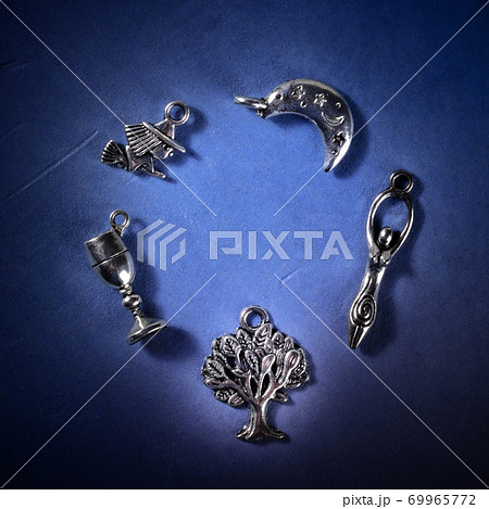 Witchcraft design template with charms of the witch, the Moon, the Goddess, the tree, the cup, with a place for text Witchcraft design template with charms of the witch, the Moon, the Goddess, the tree, the cup, with a place for text 69965772