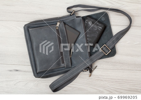 Leather shoulder bag for men with mobile phone and wallet on it 69969205