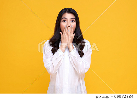 Surprised and Shocked asian woman covering mouth 69972334