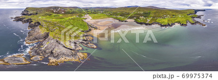 Aerial view of wild coast by Glencolumbkille in County Donegal, Irleand. Aerial view of wild coast by Glencolumbkille in County Donegal, Irleand. 69975374