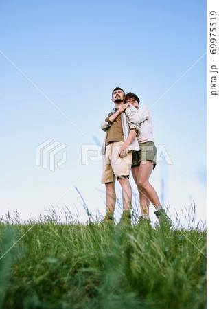 Enjoying beauty of country scape together with boyfriend 69975519
