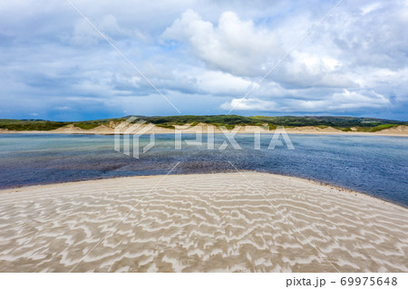 Beautiful beach in Sheskinmore bay between Ardara and Portnoo in Donegal - Ireland 69975648